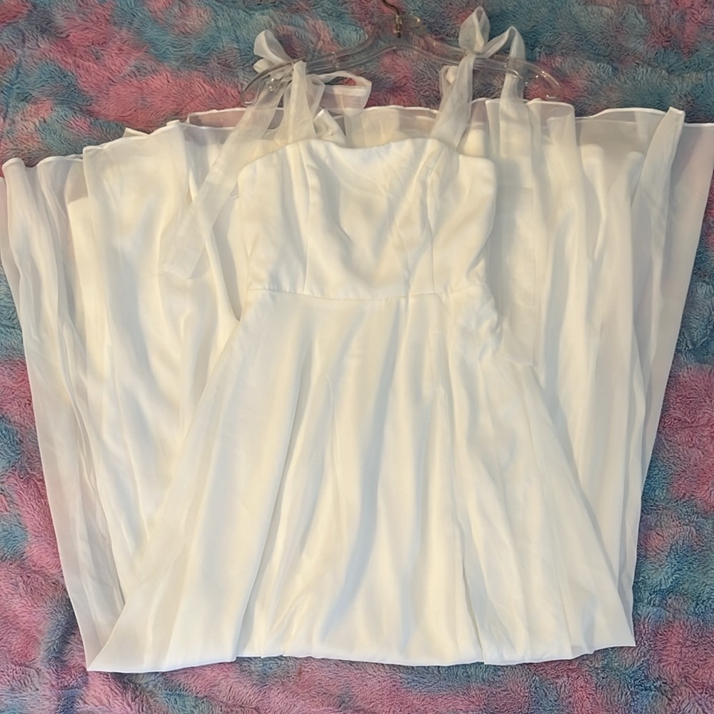 Radiant Romance White Tie-Strap Maxi Dress
Lulus